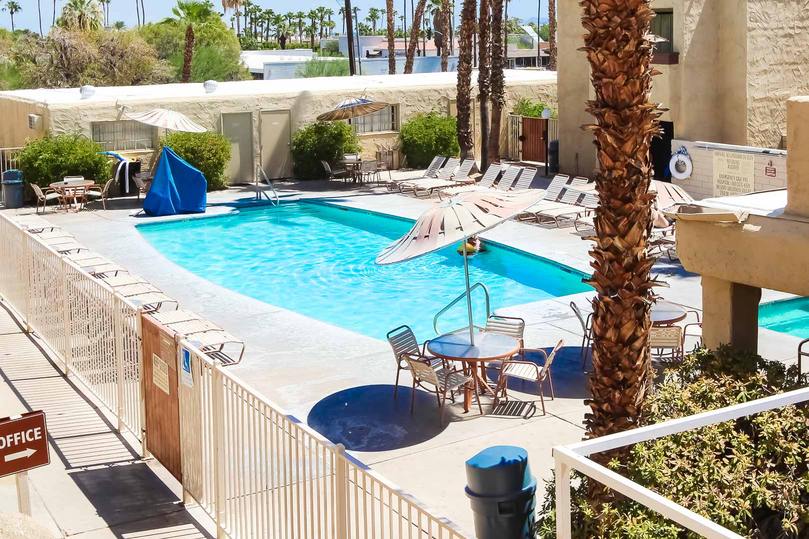 An outdoor swimming pool at VRI's Desert Vacation Villas in Palm Springs California.